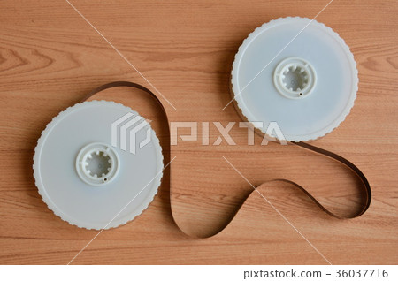 video tape recorder reel on table 36037716