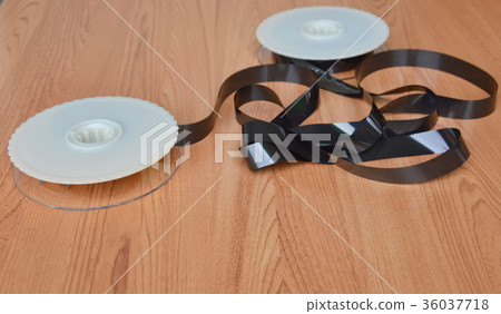 video tape recorder reel on table 36037718