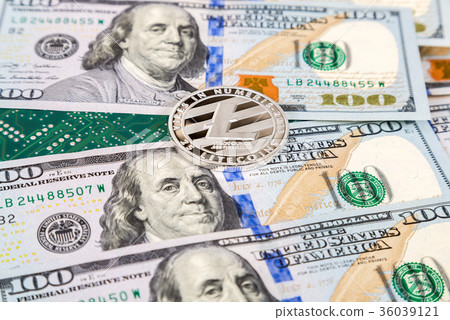 Cryptocurrency litecoin lying over american dollar 36039121