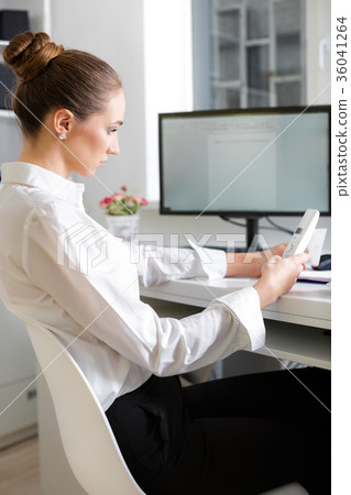 business woman talking on the phone business woman talking on the phone 36041264