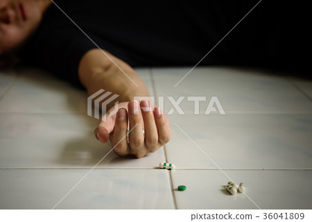 suicide death man by overdosing pills. suicide death man by overdosing pills. 36041809