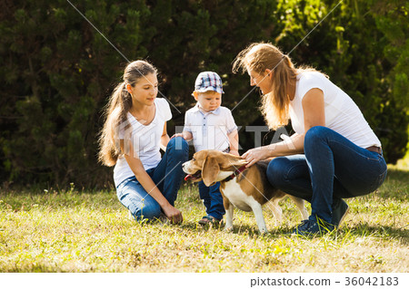 Mom with kids on a walk Mom with kids on a walk 36042183
