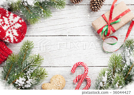 Christmas gift box, candy cane and gingerbread man Christmas gift box, candy cane and gingerbread man 36044427