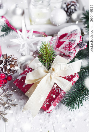 Christmas fir tree, decor, gift box and mittens 36044935