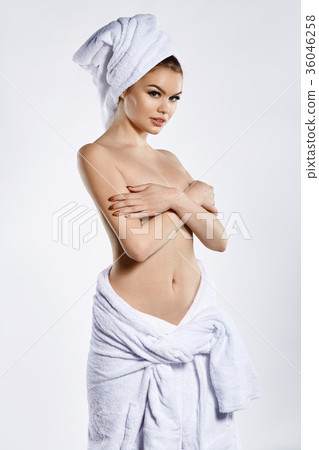 Beautiful naked woman standing in bathrobe and - Stock Photo [36046258]  - PIXTA