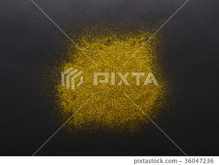 Golden glitter sand texture on black background Golden glitter sand texture on black background 36047236