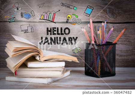 hello january, Business Concept. Stack of books and pencils on the wooden table hello january, Business Concept. Stack of books and pencils on the wooden table 36047482