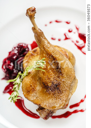 duck leg with berry sauce duck leg with berry sauce 36049873