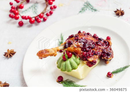 roasted duck leg with cranberry sauce roasted duck leg with cranberry sauce 36049875