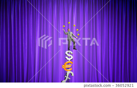 Businessman juggling with balls Businessman juggling with balls 36052921