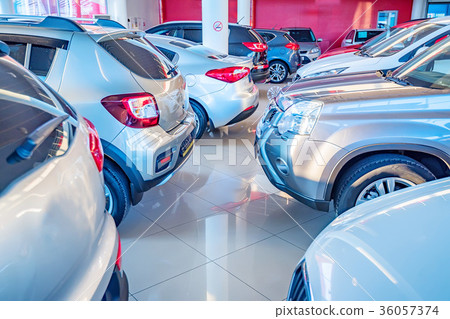 New cars at dealer showroom New cars at dealer showroom 36057374