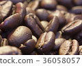 Close up coffee beans brown color 36058057