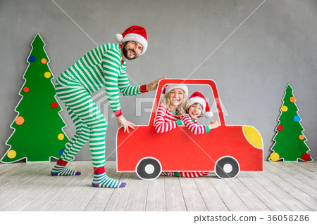 Happy family on Christmas eve Happy family on Christmas eve 36058286