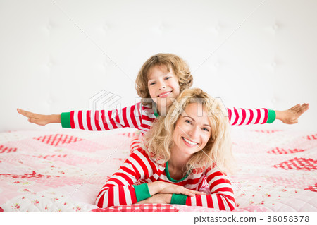 Happy family in Christmas eve 36058378