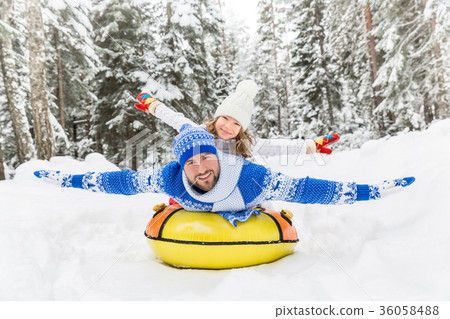 Happy family outdoor in winter Happy family outdoor in winter 36058488