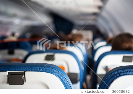 Close up passenger seats in cabin of plane Close up passenger seats in cabin of plane 36058682