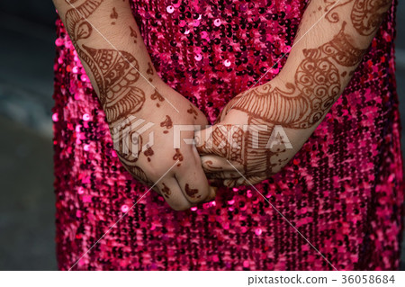 Mehendi on hands of Indian woman Mehendi on hands of Indian woman 36058684