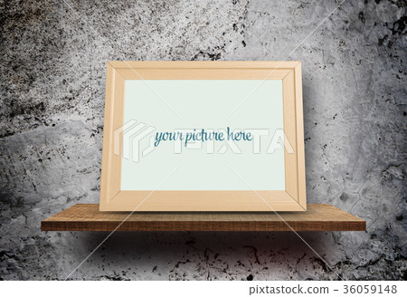 Empty photo frame on Grungy concrete wall Empty photo frame on Grungy concrete wall 36059148