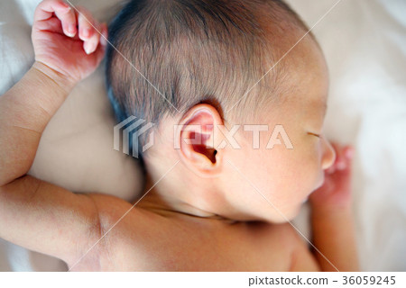Sleeping Asian newborn baby 36059245