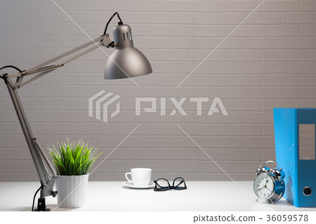 Empty white working table in fis at night Empty white working table in fis at night 36059578