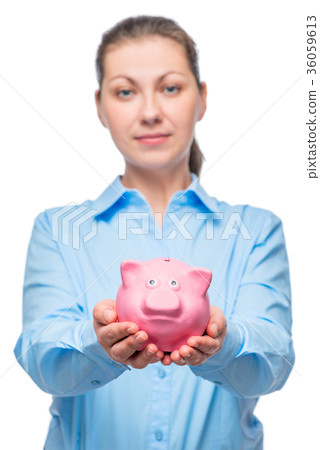 Businesswoman showing piggy bank on white 36059613