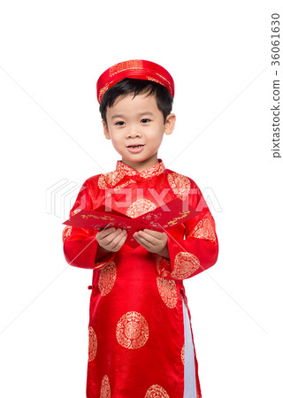 Little Vietnamese boy holding red envelops for Tet 36061630