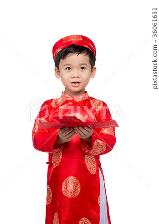 Little Vietnamese boy holding red envelops for Tet 36061631