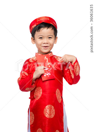 Little Vietnamese boy holding red envelops for Tet 36061635