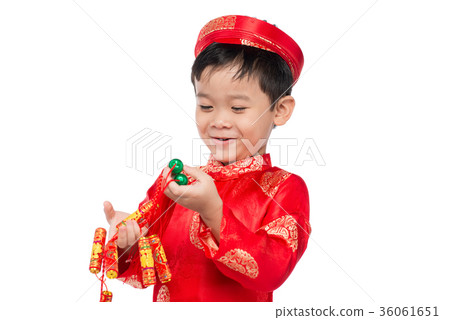 Funny and exciting Vietnamese boy with firecracker Funny and exciting Vietnamese boy with firecracker 36061651