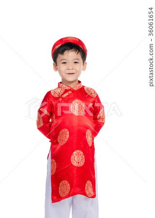 Cute little Vietnamese boy in ao dai dress smiling Cute little Vietnamese boy in ao dai dress smiling 36061654