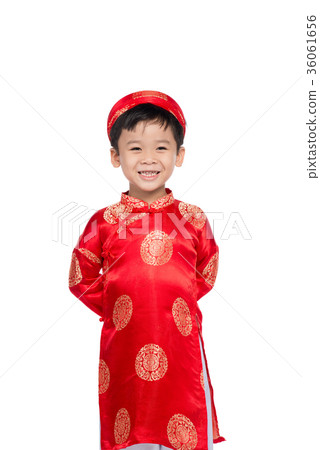 Cute little Vietnamese boy in ao dai dress smiling 36061656