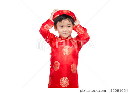 Cute little Vietnamese boy in ao dai dress smilin 36061664