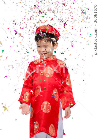 Happy Vietnamese boy in red Ao Dai celebrating 36061670