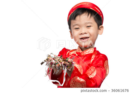 Happy Vietnamese boy in red Ao Dai celebrating  36061676