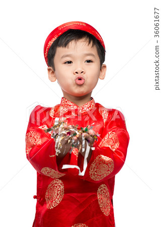Happy Vietnamese boy in red Ao Dai celebrating 36061677