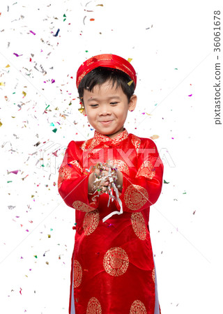 Happy Vietnamese boy in red Ao Dai celebrating 36061678