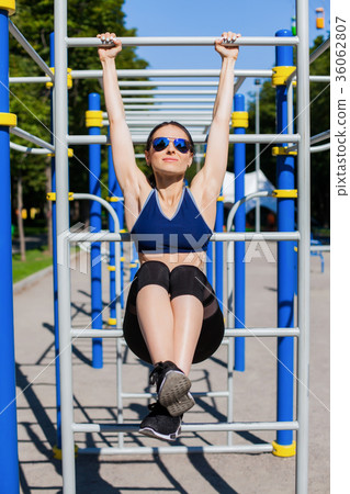 athletic woman trainer on sport playground athletic woman trainer on sport playground 36062807