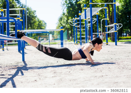 healthy sportive teen doing push ups 36062811