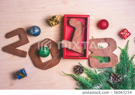 Wooden numbers 2018 with Christmas decoration Wooden numbers 2018 with Christmas decoration 36063254