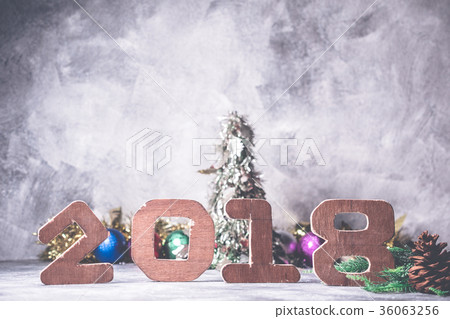 Wooden numbers 2018 with Christmas decoration Wooden numbers 2018 with Christmas decoration 36063256