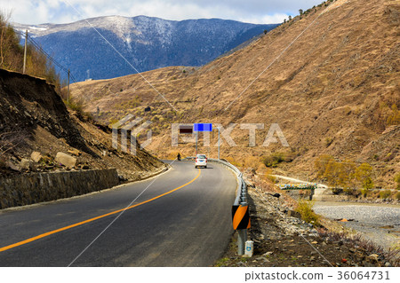Car and Motorcycle on the road Car and Motorcycle on the road 36064731