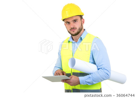 Handsome engineer working with a tablet pc Handsome engineer working with a tablet pc 36064744