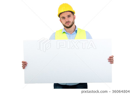 Happy male engineer holding an advertisement blank 36064804