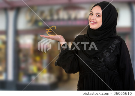 studio shot of young woman wearing traditional 36065610