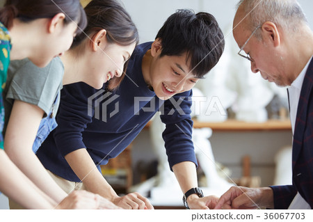 Young and senior drawing a picture 36067703