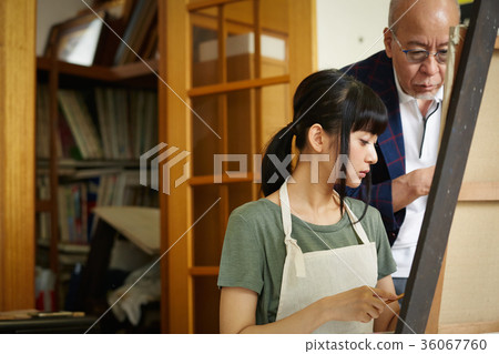 Young and senior drawing a picture 36067760