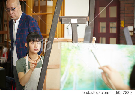 Young and senior drawing a picture Young and senior drawing a picture 36067820