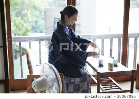 Woman enjoying a hot spring trip Woman enjoying a hot spring trip 36067880