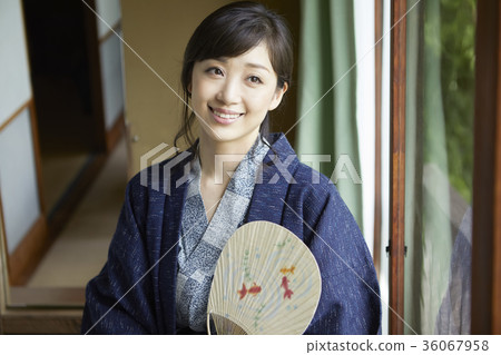 Woman enjoying a hot spring trip 36067958