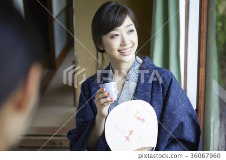Woman enjoying a hot spring trip 36067960